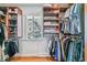 Walk-in closet with shelving and hanging racks and natural light at 1744 S Leyden St, Denver, CO 80224