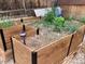 Garden boxes with rich soil and solar lights offer a great opportunity for gardening at 1744 S Leyden St, Denver, CO 80224