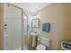 Simple bathroom with pedestal sink and shower at 6817 S Webster St # C, Littleton, CO 80128