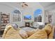 Living room features a fireplace and large windows at 6817 S Webster St # C, Littleton, CO 80128