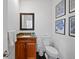 Modern powder room with granite vanity and updated fixtures at 6817 S Webster St # C, Littleton, CO 80128