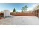 Backyard featuring a shed, wood fence, and gravel ground cover at 3071 S Truckee St, Aurora, CO 80013