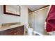 Bathroom featuring a granite countertop vanity, toilet, and shower with glass door at 3071 S Truckee St, Aurora, CO 80013