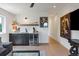 Wet bar with wine fridge, modern cabinetry, and sleek countertops for entertaining at 2702 Lowell Blvd, Denver, CO 80211