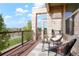 Inviting balcony with outdoor seating and views of the neighborhood at 8953 E Northfield Blvd, Denver, CO 80238