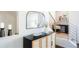 Chic hallway featuring stylish decor and a view of the staircase at 8953 E Northfield Blvd, Denver, CO 80238