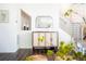 Hallway design featuring a mirror, minimalist decor, stairs and a small niche at 8953 E Northfield Blvd, Denver, CO 80238