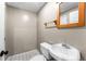 Neutral half-bathroom with functional fixtures and a warm, inviting atmosphere at 2331 Ance St, Strasburg, CO 80136