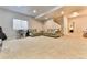 Spacious basement with plush carpet and neutral walls at 795 Woodmoor Acres Dr, Monument, CO 80132