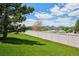 Green backyard with mountain views and privacy fence at 9747 W Peakview Dr, Littleton, CO 80123