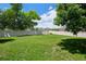 Spacious green backyard with a privacy fence at 9747 W Peakview Dr, Littleton, CO 80123