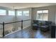 Upstairs loft with chairs and views of the front landscape at 9482 Kendrick Way, Arvada, CO 80007