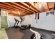 Spacious unfinished basement area with concrete floor, and stairs at 6624 S Sycamore St, Littleton, CO 80120