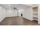 Bedroom with wood-look floors, a ceiling fan, built in shelving and a bathroom at 1843 S Pierson Ct, Lakewood, CO 80232