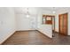 Dining room area near the front door entrance with natural light at 1843 S Pierson Ct, Lakewood, CO 80232