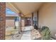 Inviting home entrance with brick pillars and a pathway with low maintenance gravel ground covering at 1843 S Pierson Ct, Lakewood, CO 80232