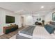 Cozy main bedroom featuring modern decor, ample natural light, and comfortable furnishings at 1843 S Pierson Ct, Lakewood, CO 80232