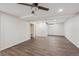 Spacious room featuring durable floors, offering a versatile space for recreation or hobbies at 1843 S Pierson Ct, Lakewood, CO 80232