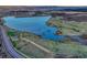 Scenic aerial view overlooking the expansive lake and natural landscape surrounding the community at 3242 Waterfront Dr, Monument, CO 80132