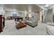 Spacious basement living room featuring a pool table, seating, and a cozy atmosphere at 3242 Waterfront Dr, Monument, CO 80132
