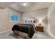 Comfortable bedroom features neutral colors and a window to the outside at 3242 Waterfront Dr, Monument, CO 80132