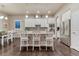 Bright kitchen with a center island, stainless steel appliances, and modern finishes at 3242 Waterfront Dr, Monument, CO 80132