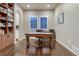 Spacious office boasts a large bookshelf and hardwood floors at 3242 Waterfront Dr, Monument, CO 80132