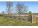 Gated community pool featuring an outdoor lounge area, set in a well-manicured green space at 14110 Greenfield Loop, Parker, CO 80134