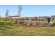 Community playground with picnic shelter amongst landscaping and well-maintained green grass at 14110 Greenfield Loop, Parker, CO 80134