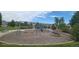 Community playground with modern equipment and seating areas, fostering outdoor fun and social interaction at 14110 Greenfield Loop, Parker, CO 80134