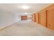Finished basement boasting neutral walls and flooring, offering versatile design options at 2130 Frontier Ln, Franktown, CO 80116
