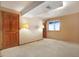 Basement bedroom with a cozy feel, featuring a window and ample space at 2130 Frontier Ln, Franktown, CO 80116