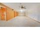 Spacious finished basement featuring a ceiling fan, neutral walls, and carpet flooring at 2130 Frontier Ln, Franktown, CO 80116