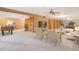 Finished basement features entertainment area, decorative furniture, and carpet flooring at 2130 Frontier Ln, Franktown, CO 80116