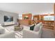 Inviting living room with soft neutral tones, plush seating and stylish rug at 2130 Frontier Ln, Franktown, CO 80116
