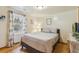 Well-lit bedroom with hardwood floors and curtains at 4364 Colorado 103, Idaho Springs, CO 80452