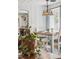 Bright dining area with a view into the kitchen, featuring a stylish chandelier at 4364 Colorado 103, Idaho Springs, CO 80452
