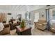 Spacious living room blending into the dining area, showcasing the seamless flow and inviting atmosphere at 4364 Colorado 103, Idaho Springs, CO 80452