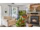 Inviting living room featuring fireplace, flatscreen tv and comfortable seating at 4364 Colorado 103, Idaho Springs, CO 80452