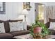 Cozy living room with a comfy couch and a view into a sunlit bedroom at 4364 Colorado 103, Idaho Springs, CO 80452