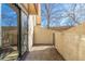 Private outdoor patio with sliding glass door, perfect for relaxing outdoors at 1060 S Parker Rd # 36, Denver, CO 80231