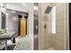 Stylish bathroom with double sinks, a walk-in shower, and a modern design at 2565 Champa St, Denver, CO 80205