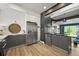 Modern kitchen with stainless steel appliances, sleek cabinetry, and a stylish design at 2565 Champa St, Denver, CO 80205