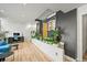 Contemporary space featuring an office area, modern decor, and lots of houseplants at 2565 Champa St, Denver, CO 80205