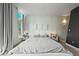Spacious main bedroom with lots of natural light and neutral color palette at 2565 Champa St, Denver, CO 80205