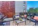 Cozy outdoor patio with comfortable seating, perfect for relaxing and entertaining guests at 2565 Champa St, Denver, CO 80205