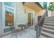 Cozy outdoor patio with seating and a staircase leading to upper levels, perfect for relaxation at 2565 Champa St, Denver, CO 80205