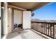 Outdoor balcony with an attached storage room and views of the community at 23405 E 5Th Pl # 201, Aurora, CO 80018