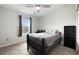 Bedroom with ceiling fan, neutral carpet, and natural light at 23405 E 5Th Pl # 201, Aurora, CO 80018