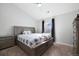 Cozy bedroom featuring natural lighting and matching furniture sets at 23405 E 5Th Pl # 201, Aurora, CO 80018